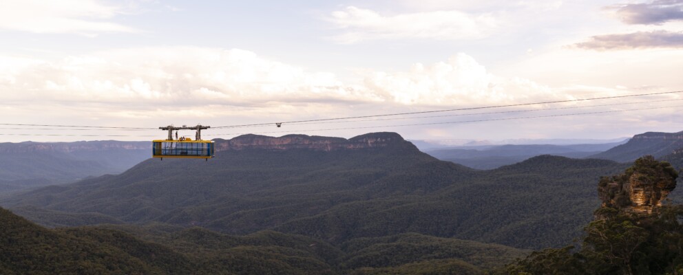 Couple enjoying the Beyond Skyway experience at Scenic World, Katoomba.